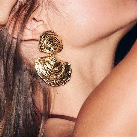 Gold seashell earrings